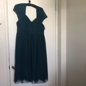 Teal dress with retro flair